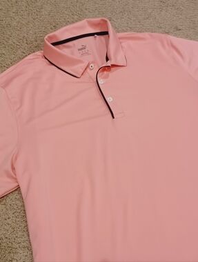 PUMA Men's MATTR Elevated Solid Golf Performance Polo in a pink/rose color.